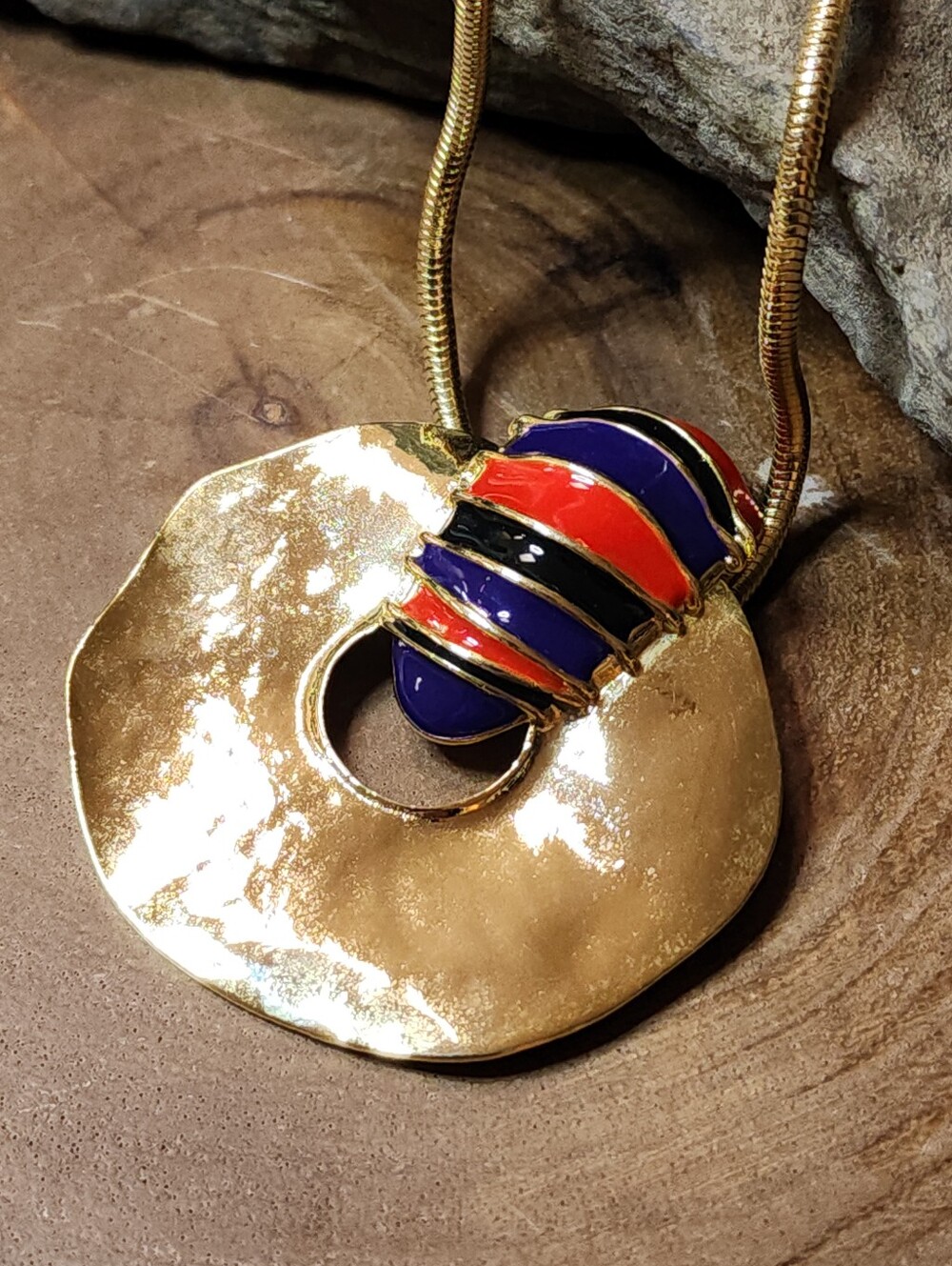 Gold Toned Snake Chain Necklace with Red, Blue & Black Enamel Pendant
